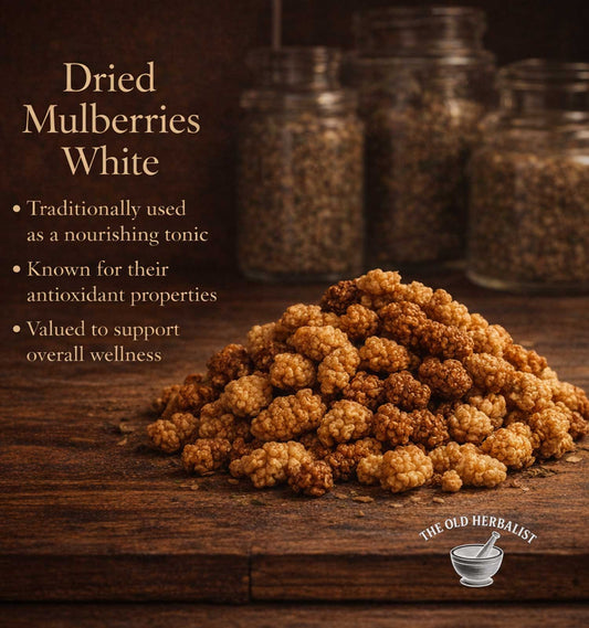 Dried mulberries with text about their uses on a wooden surface, branded 'The Old Herbalist'.