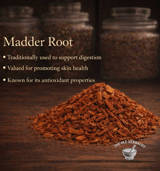 Madder root on a wooden surface with text about its uses and 'The Old Herbalist' branding.