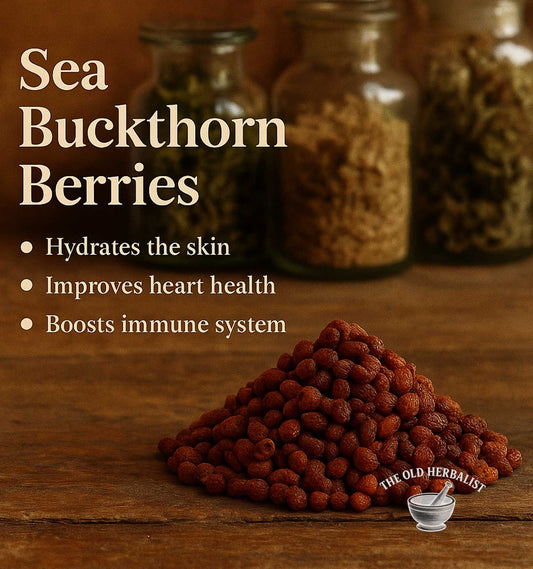 Sea buckthorn berries with health benefits listed on a wooden surface, featuring The Old Herbalist brand.