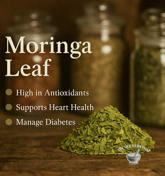 Moringa leaf with health benefits text on a wooden background