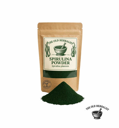 Dried spirulina powder in kraft pouch – herbal superfood ingredient.
