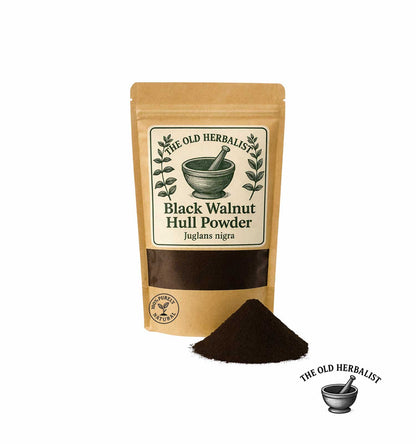 Bag of Black Walnut Hull Powder with powder spilling out on a white background