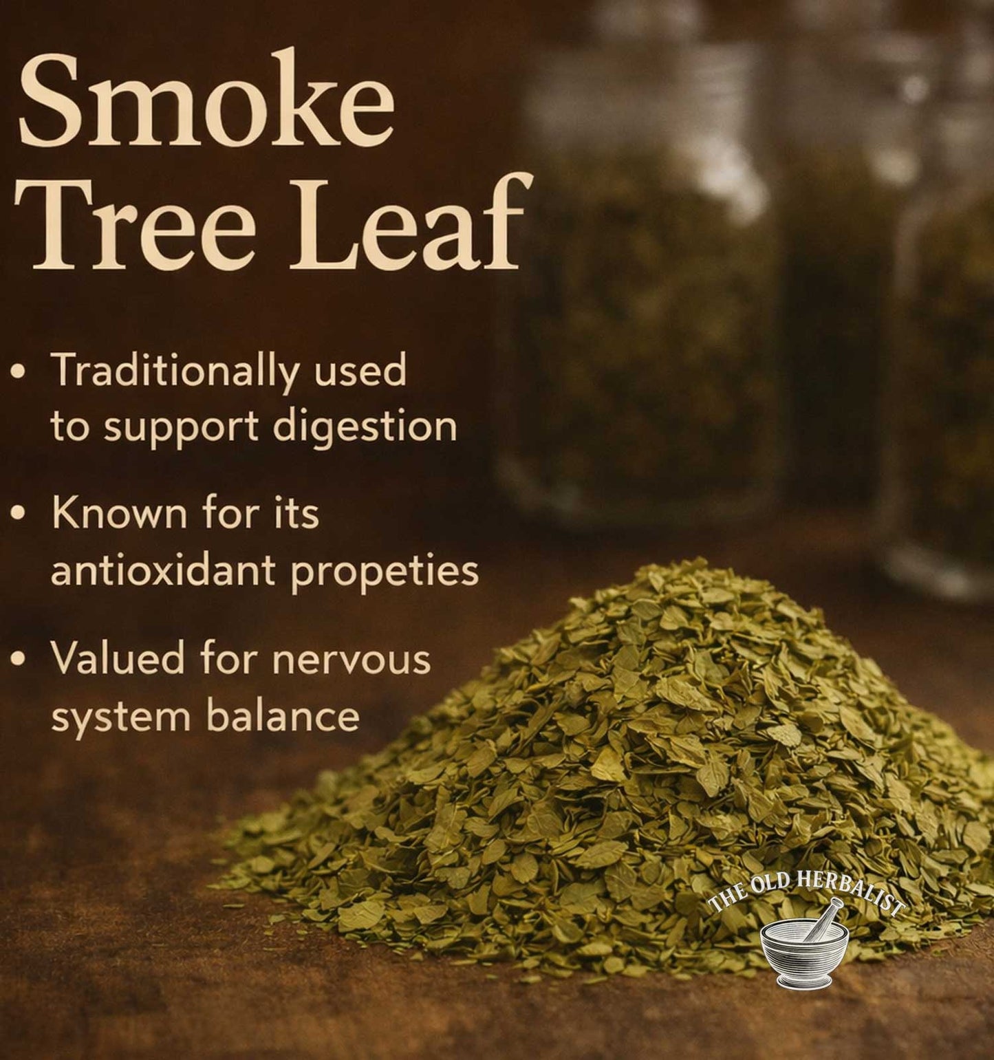 Heap of smoke tree leaf with text about its uses on a wooden surface, featuring The Old Herbary logo.
