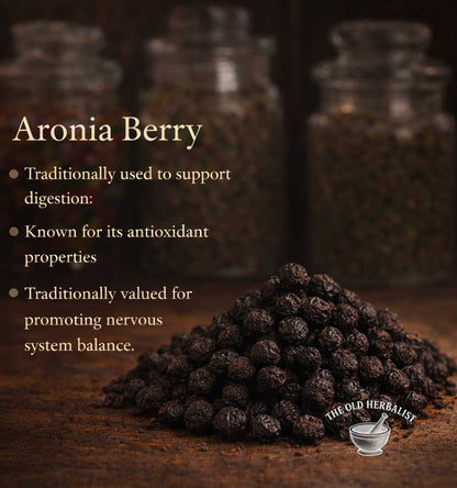Aronia berries with text about their uses and The Old Herbalist logo.