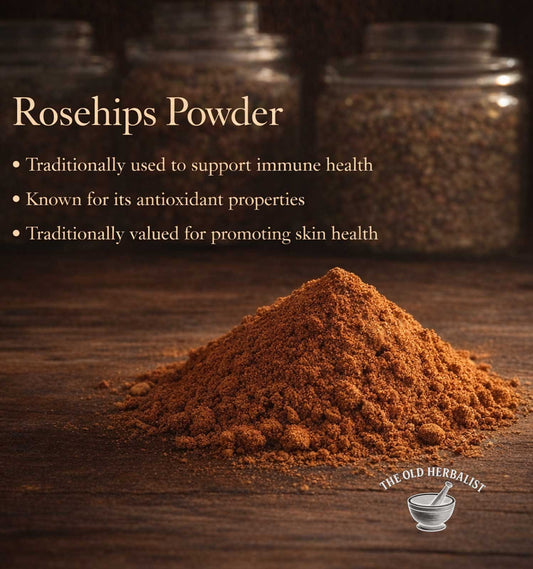 Rosehips Powder with health benefits text on a wooden background, featuring The Old Herbalist logo.