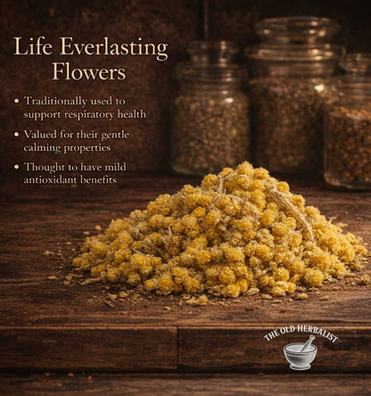 Life Everlasting Flowers on a wooden surface with text about their uses and The Old Herbalist branding.