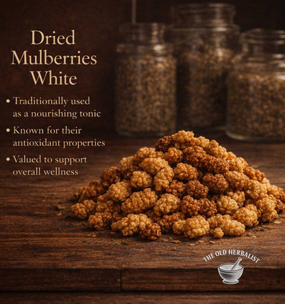 Dried mulberries with text about their uses on a wooden surface, branded 'The Old Herbalist'.