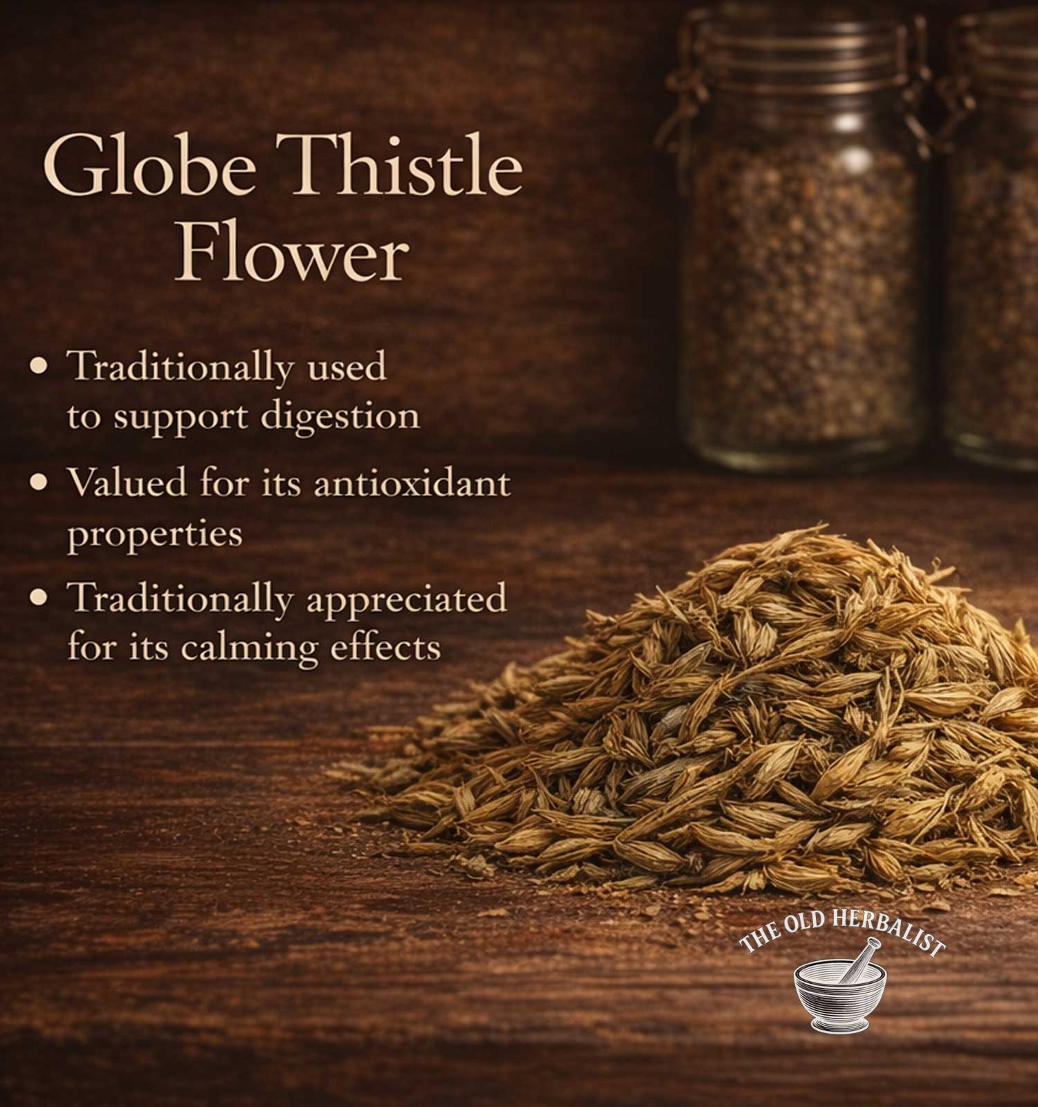 Globe Thistle Flower on a wooden surface with text about its uses and The Old Herbalist logo.