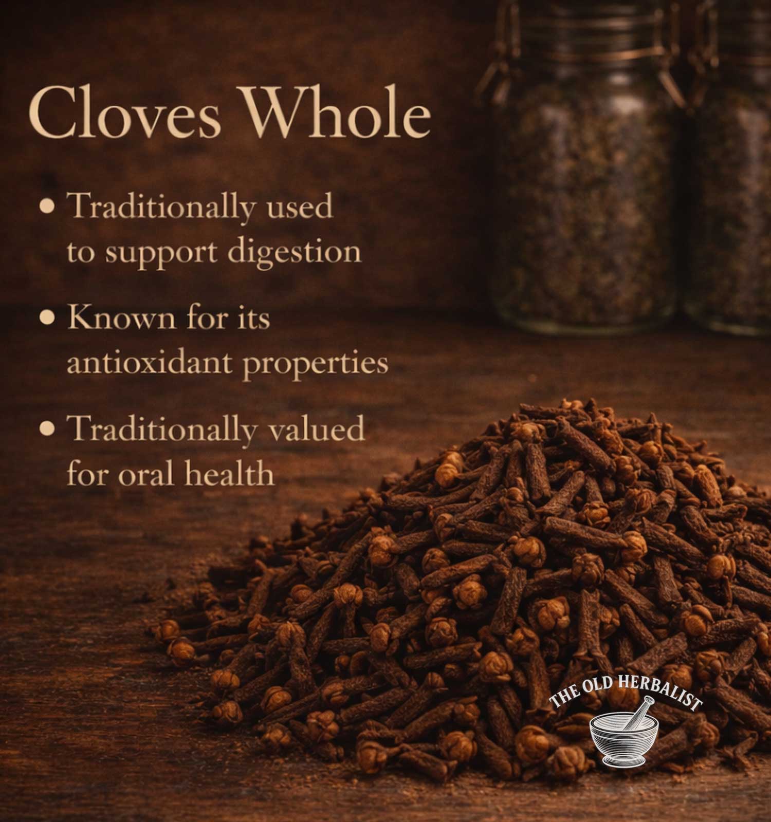 Cloves Whole with text on a wooden background, featuring The Old Herbalist logo.