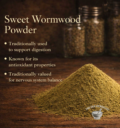 Sweet wormwood powder with text on a wooden background