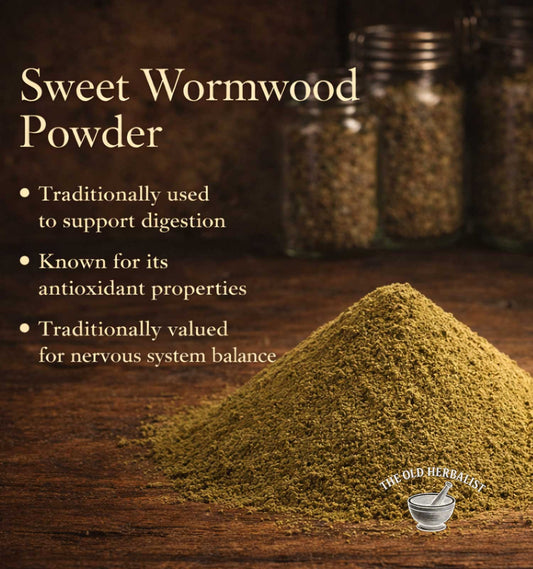 Sweet wormwood powder with text on a wooden background