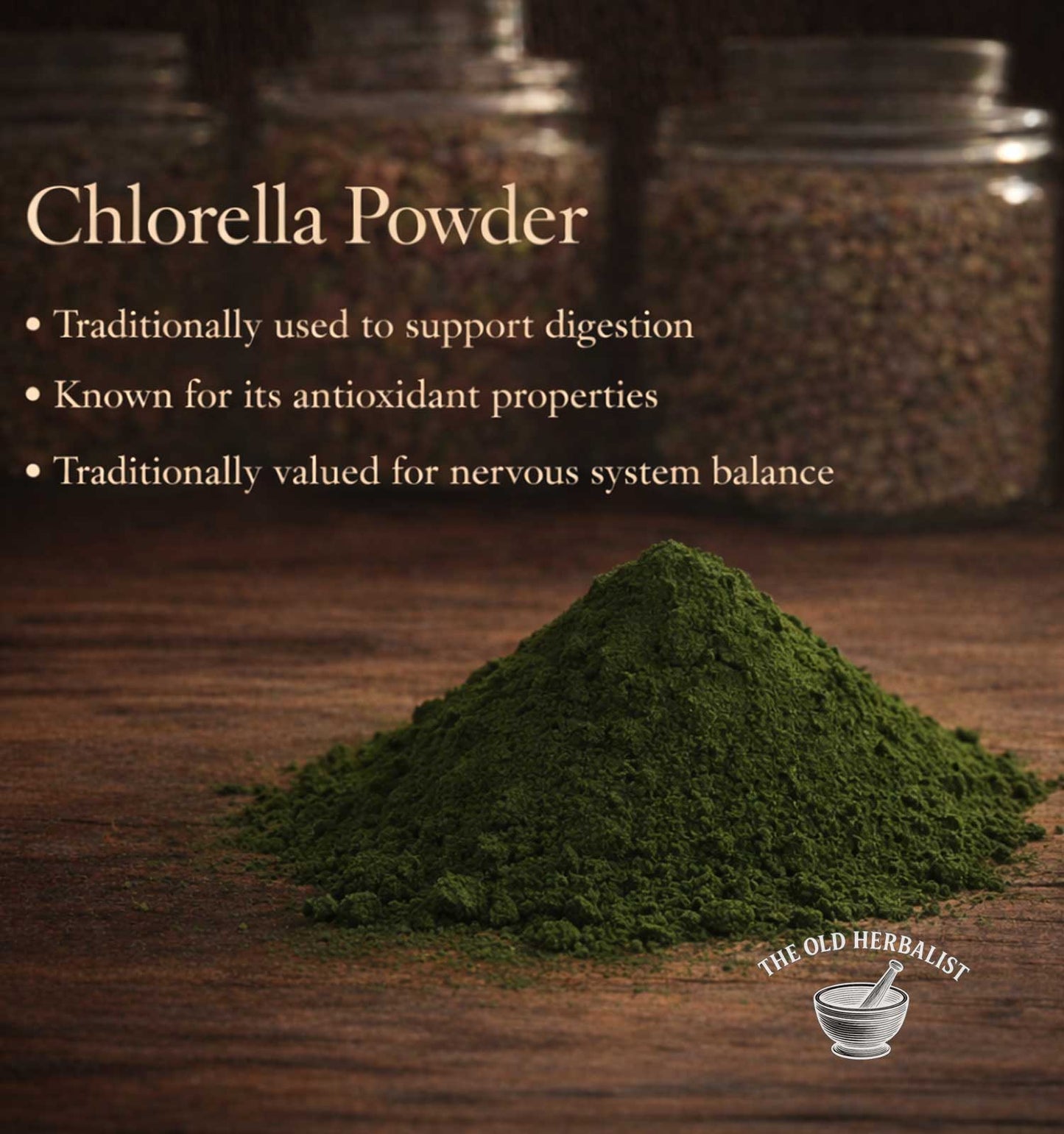 Chlorella powder on a wooden surface with text about its benefits and The Old Herbalist branding.