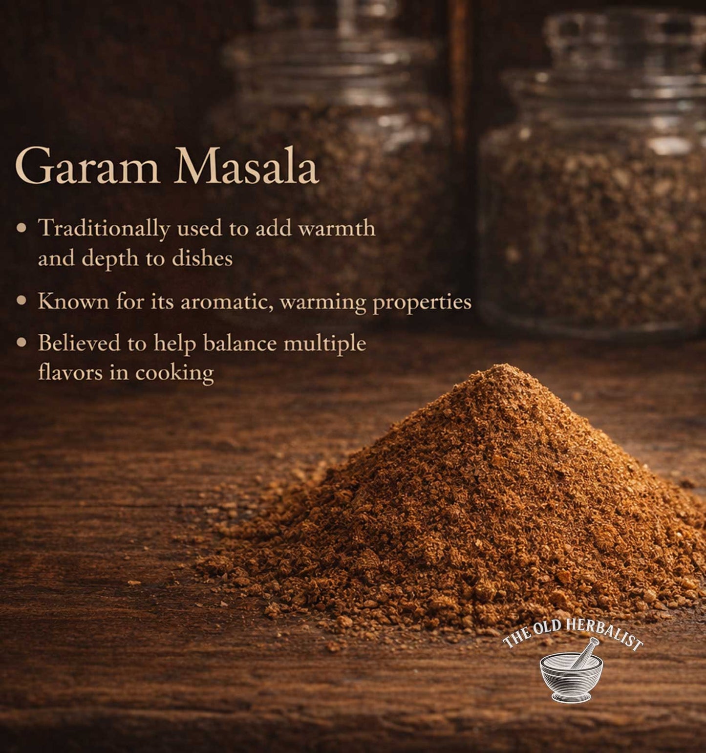 Garam Masala spice on a wooden surface with text about its uses and properties, branded 'The Old Herbalist'.