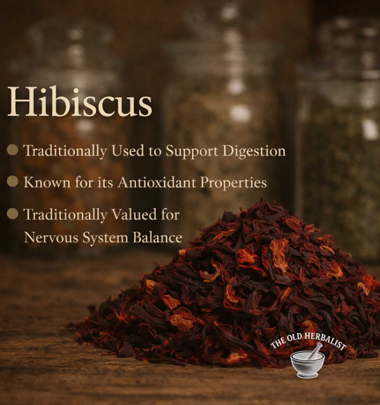 Hibiscus tea leaves with text about its uses on a wooden surface, branded 'The Old Herbalist'.