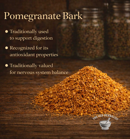 Pomegranate bark on a wooden surface with text about its uses and The Old Herbalist branding.