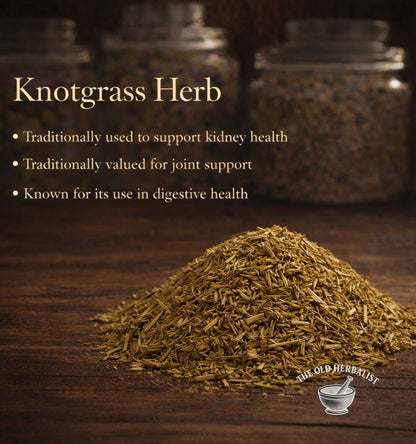 Knotgrass herb on a wooden surface with text about its uses, branded 'The Old Herbalist'.