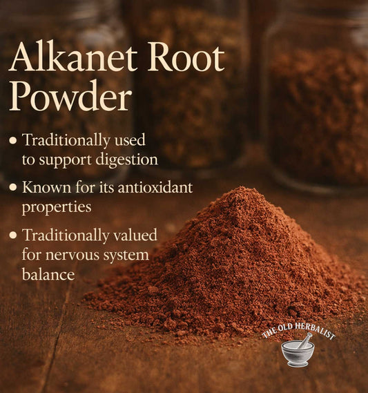 Alkanet root powder with text about its uses on a wooden surface, featuring The Old Herbalist logo.