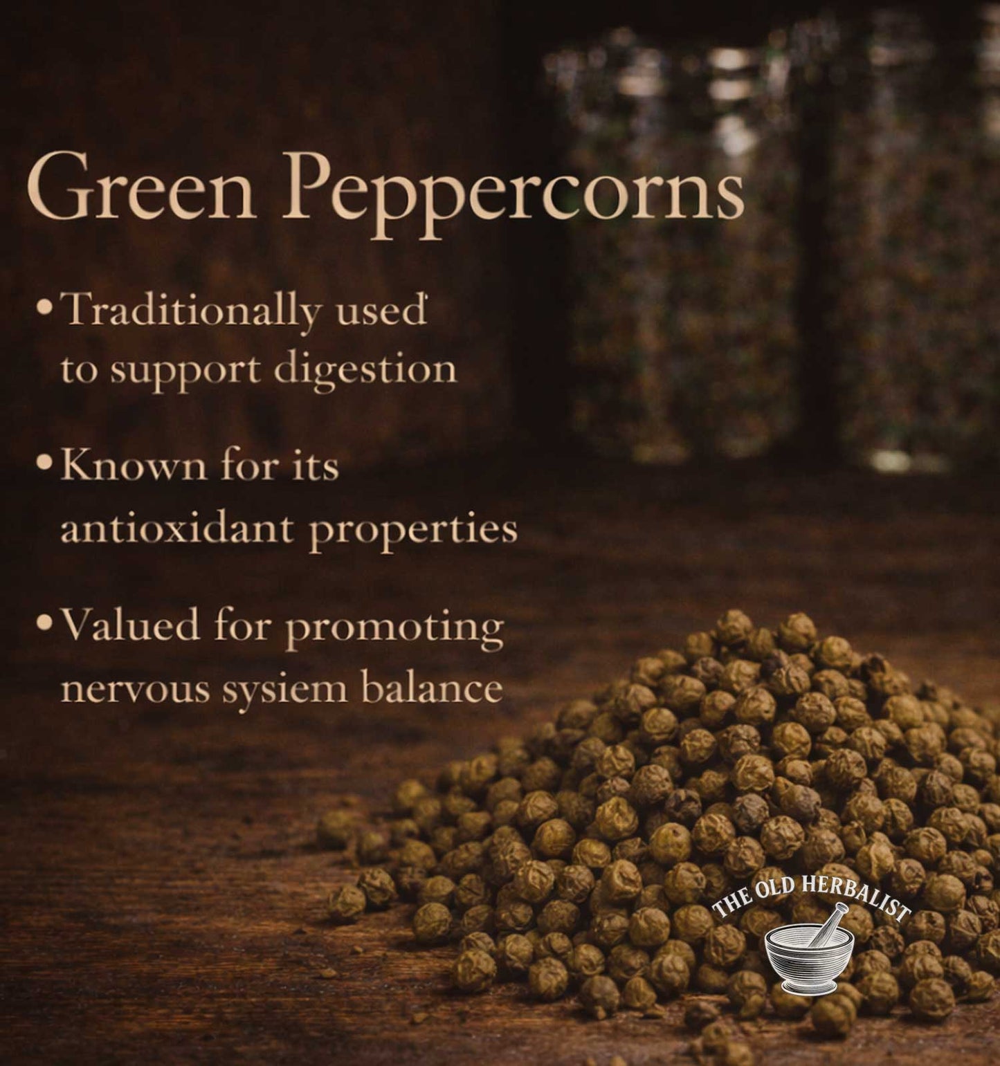 Green peppercorns with text about their uses on a wooden surface, branded 'The Old Herbalist'.