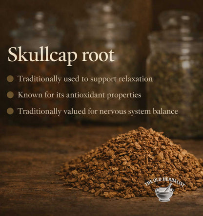 Skullcap root with text about its uses on a wooden surface, featuring jars in the background.