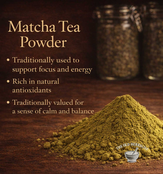 Matcha tea powder with text about its benefits on a wooden surface, featuring jars in the background.