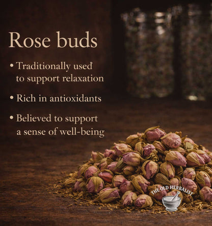 Rose buds with text about their uses on a dark background, featuring 'The Old Herbalist' logo.