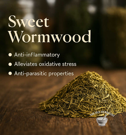 Heap of sweet wormwood on a wooden surface with text highlighting its properties.
