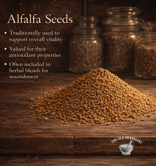Alfalfa seeds on a wooden surface with text about their uses and The Old Herbalist logo.