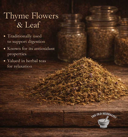 Thyme flowers and leaf on a wooden surface with jars in the background, featuring text about thyme's uses.