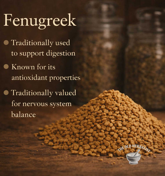 Fenugreek seeds with text about its uses on a wooden surface, featuring The Old Herbalist logo.