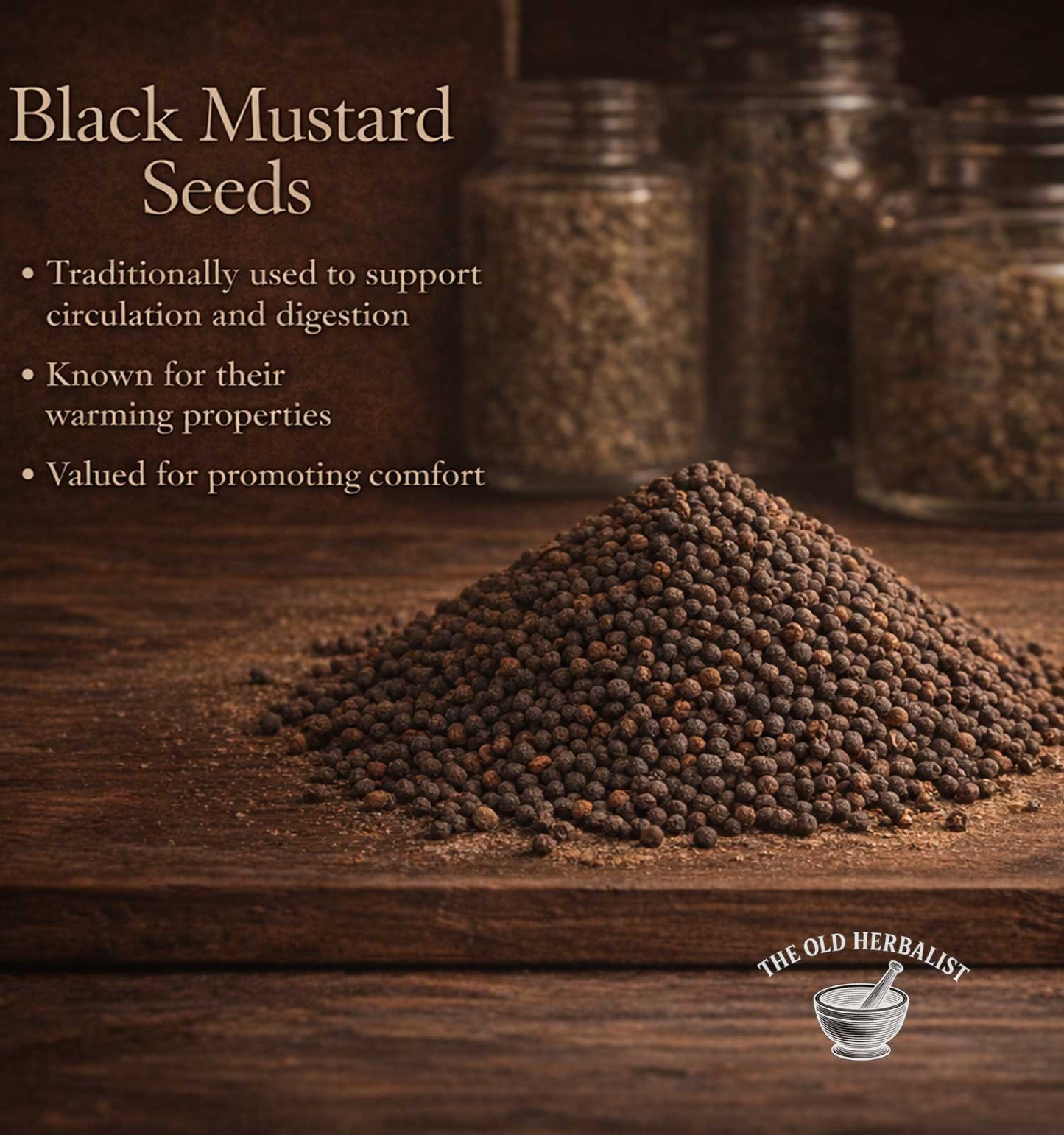 Black mustard seeds on a wooden surface with text about their uses and The Old Herbalist logo.