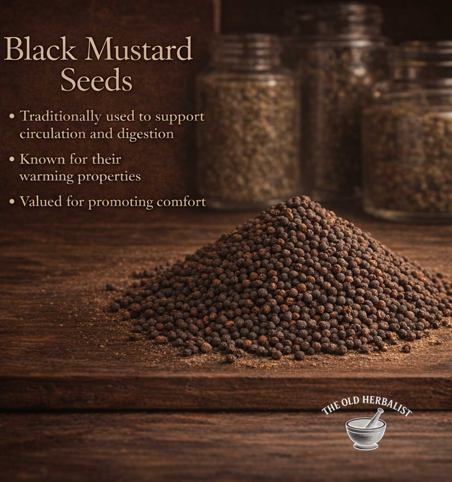 Black mustard seeds on a wooden surface with text about their uses and The Old Herbalist logo.