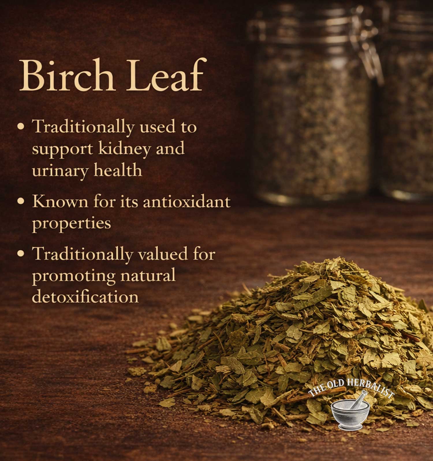 Birch leaf with text on its traditional uses and benefits, displayed on a wooden surface.