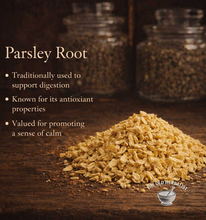 Parsley root on a wooden surface with text about its uses and The Old Herbalist logo.