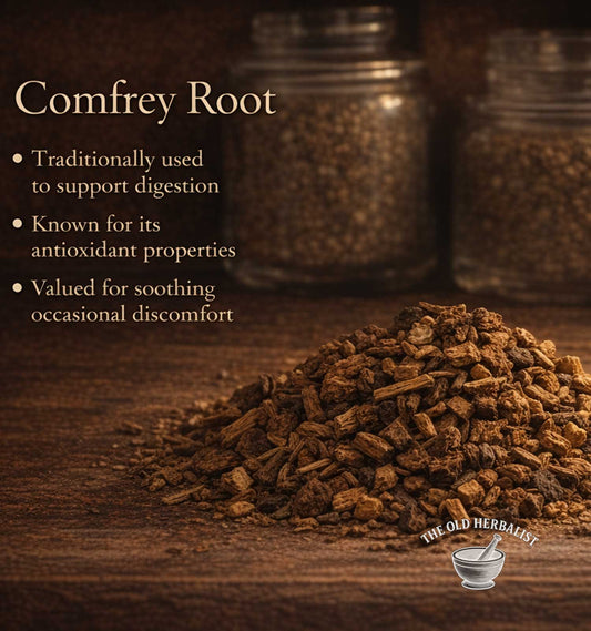 Comfrey root with text about its uses on a wooden surface, featuring The Old Herbalist logo.
