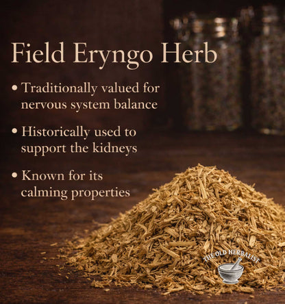 Field Eryngo Herb with text on a wooden background