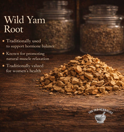 Wild Yam Root on a wooden surface with text about its uses and The Old Herbalist branding.