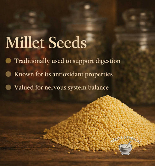 Millet seeds with text about their health benefits on a wooden surface.